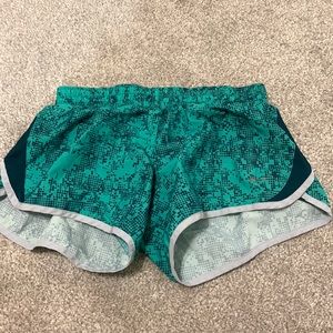 Green spotted Nike dri fit shorts